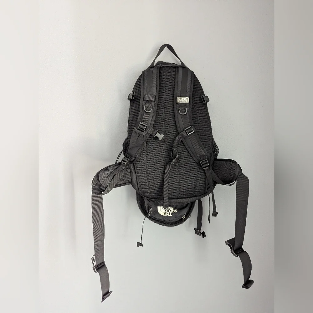 The North Face Black Amira Backpack With Adjustable Chest And Waist Straps.